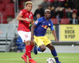 Pierre Kunde (Mainz) and Amadou Haidara (RB Leipzig).