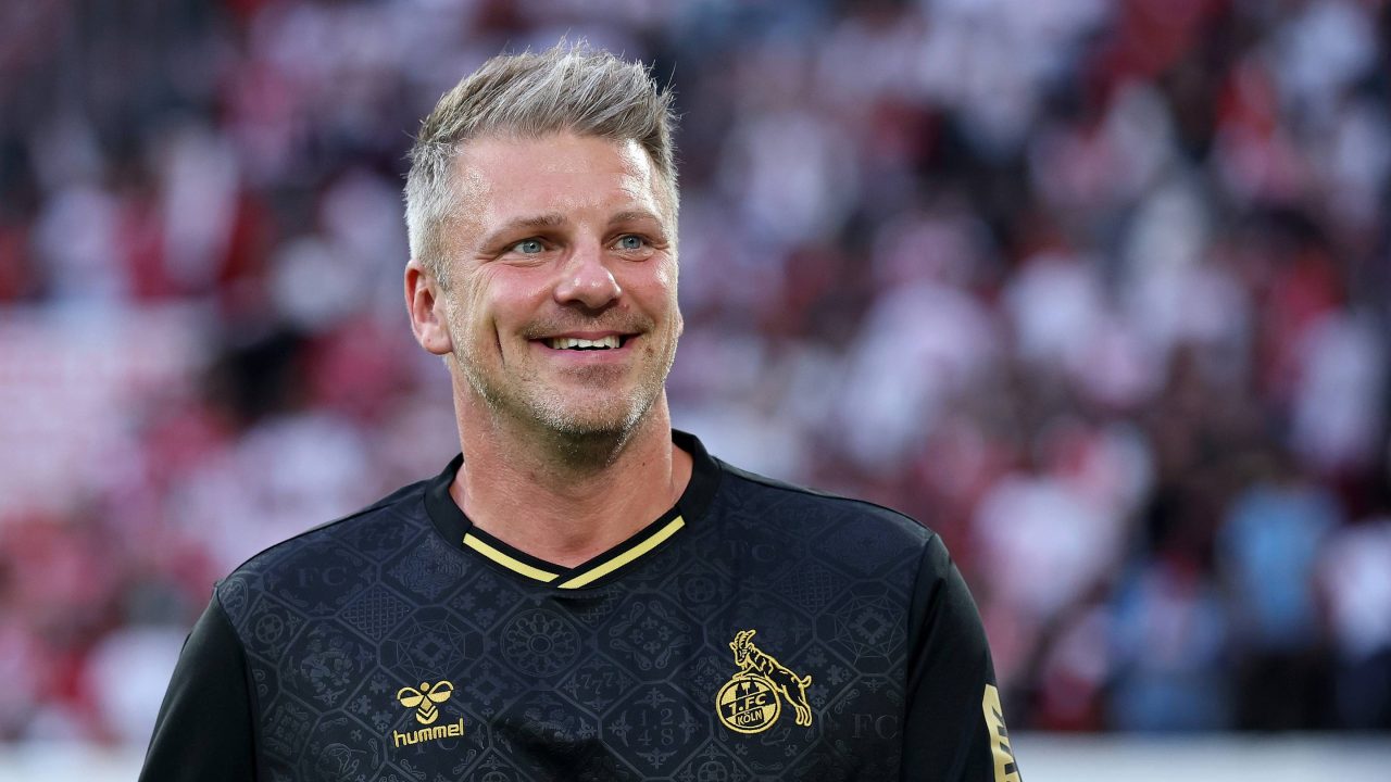 FC Koln head coach turning heads for unusual touchline antics